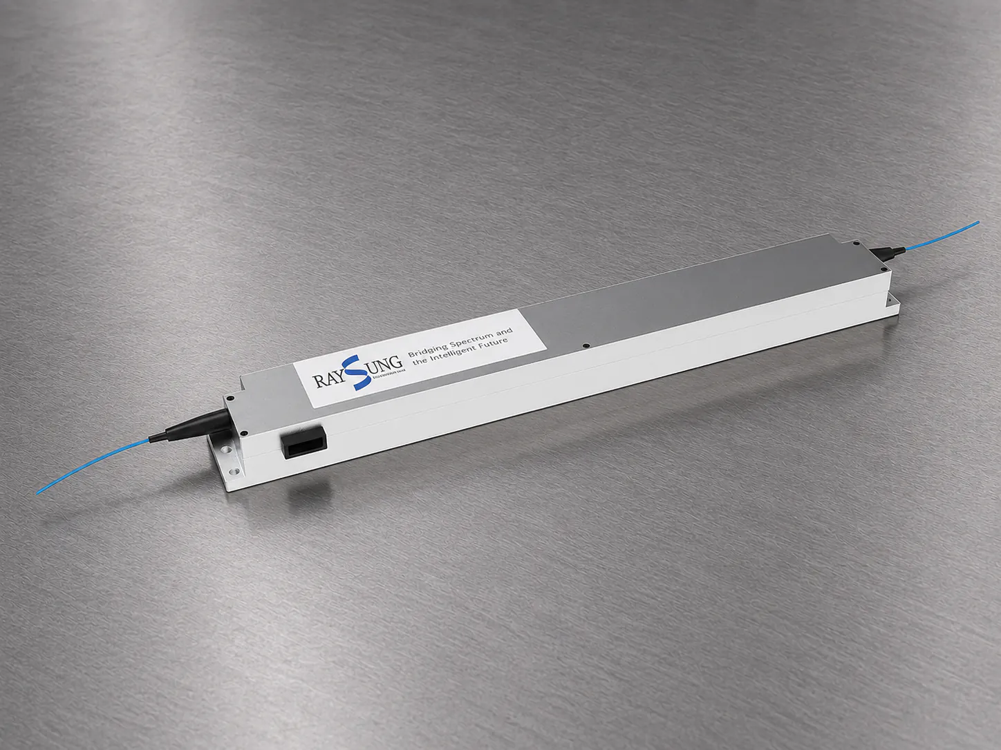 Tunable fiber Bragg grating pulse stretcher module with fiber pigtails