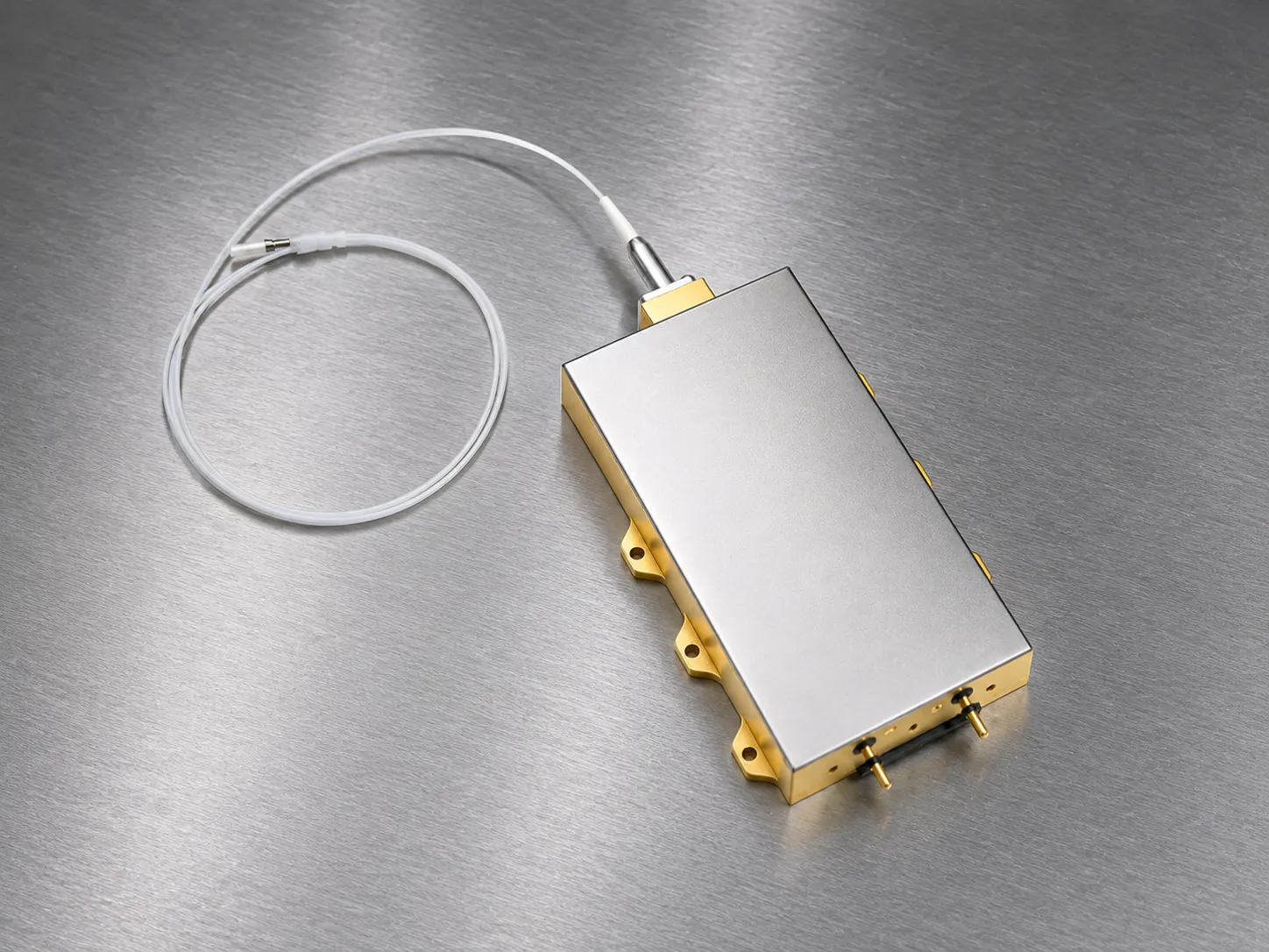 Fiber-coupled semiconductor laser diode module with gold-plated housing and output pigtail